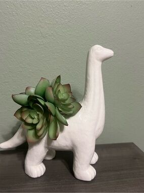 Hobby Lobby dinosaur planter with drainage holes